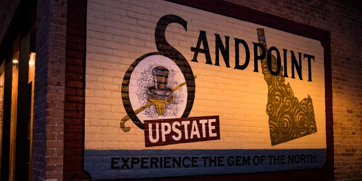 Sandpoint Idaho sign painted on brick wall