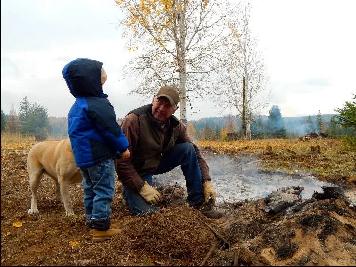 Gabe and Steve checking out a burned pile.