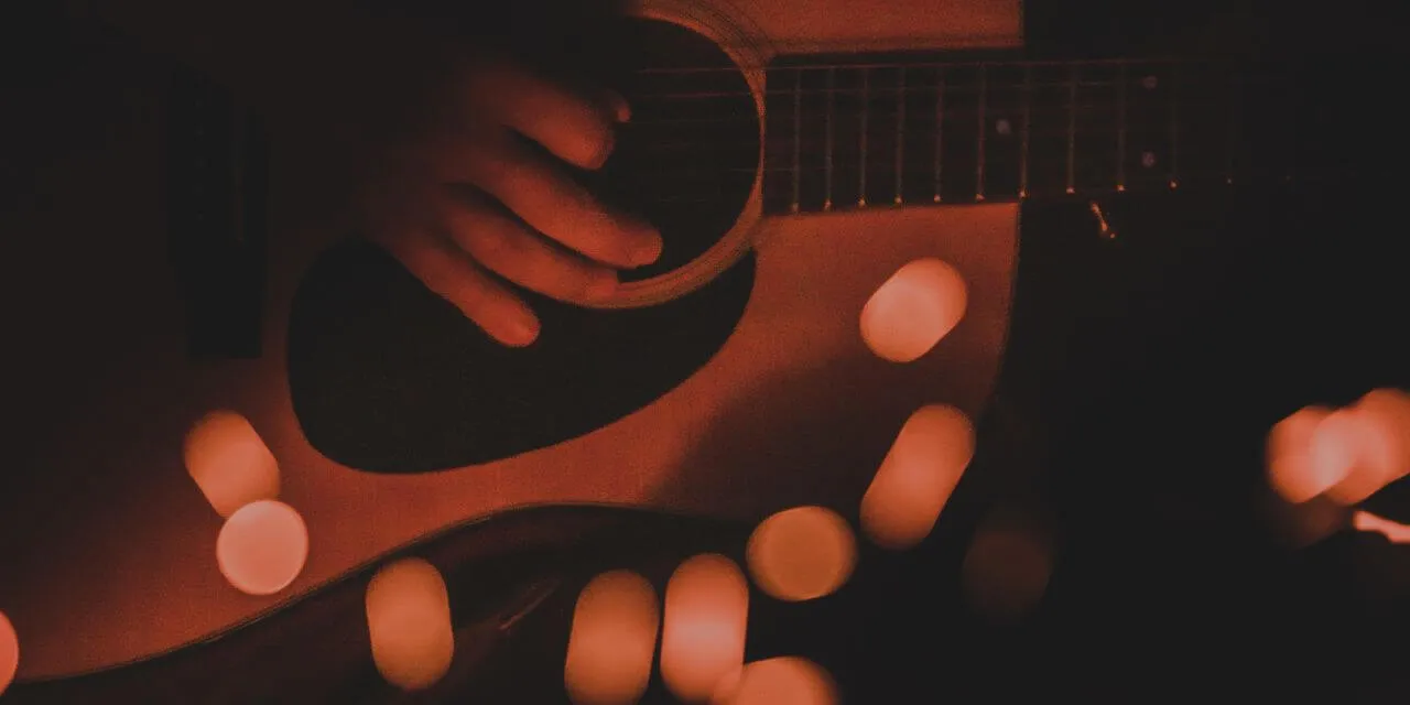 guitar at campfire