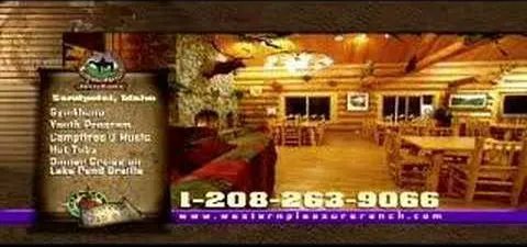 The lodge dining room with the words Sandpoint, Idaho, sleigh rides, youth program, campfires and music, hot tubs, dinner cruise on Lake Pend Oreille, and the ranch phone number