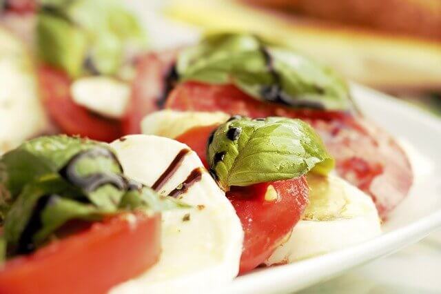 salad with cheese, tomatoes, and basil